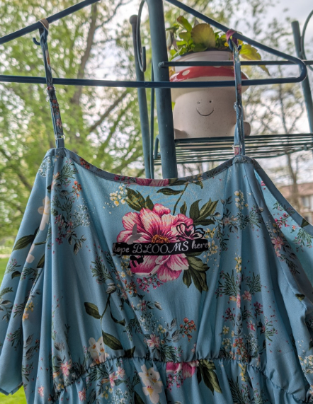 Hope Blooms Here – Upcycled Blue Floral Ruffle Dress